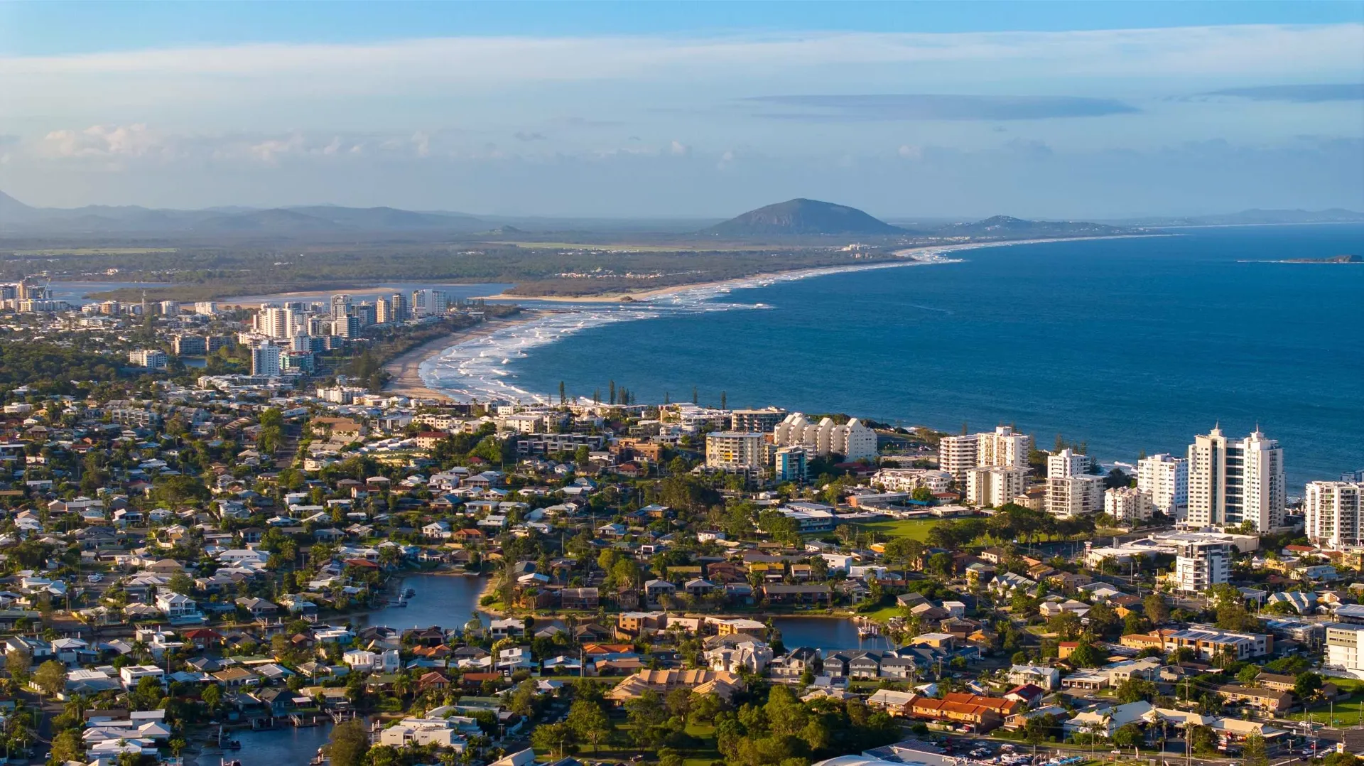 Aerial view of Mooloolaba beachfront apartments and the headland