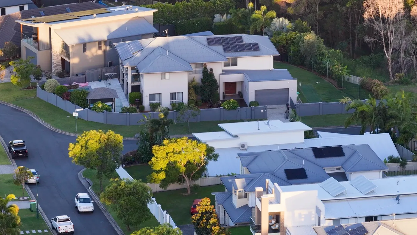 Aerial view of newly built homes on a Sunshine Coast street