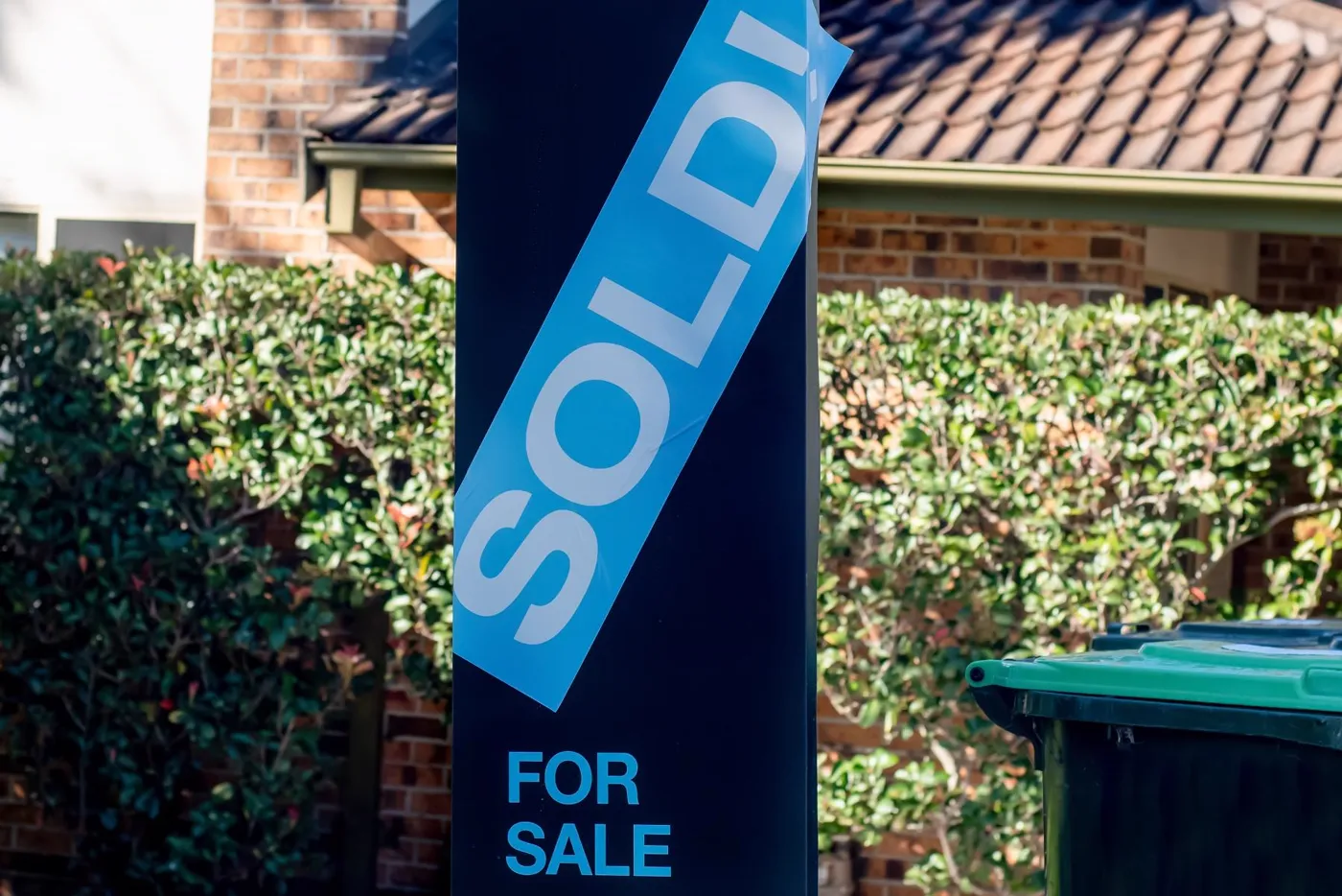 Sold sign outside a Sunshine Coast home bought with buyers agent support